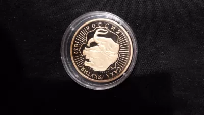 Золотая коллекционная монета Сбербанка